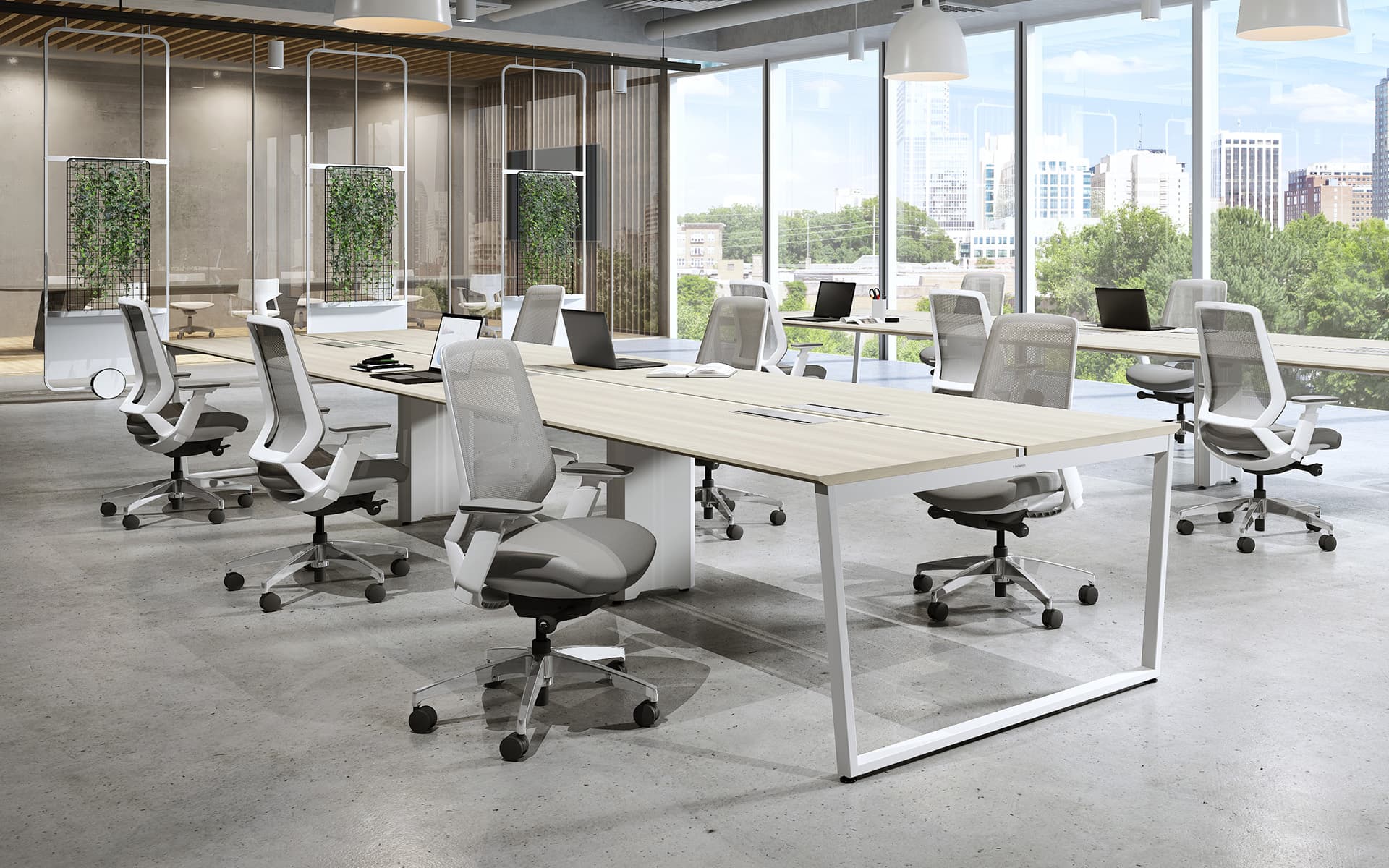 Several Okamura Abilis office chairs with light grey upholstery and mesh backrest and white frame at big office desks in a bright, open conference room with big windows.